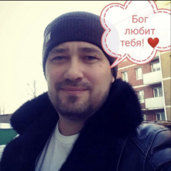 Александр Тау